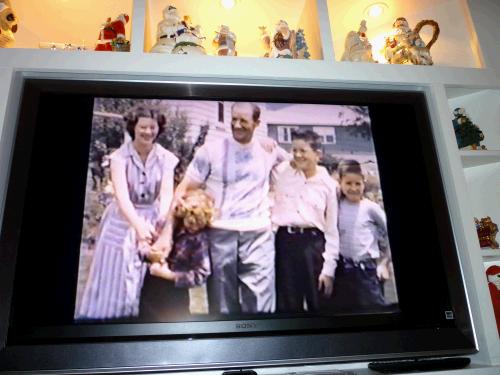 The Wallace A. Brown family around 1945.  Left to right -- Aunt Shirley, little sister Lynne, Great Grandpa Wally, Grandpa Wally, and little brother David.  Of course Thirza isn't in it because she is the one holding the camera - like all good moms do.