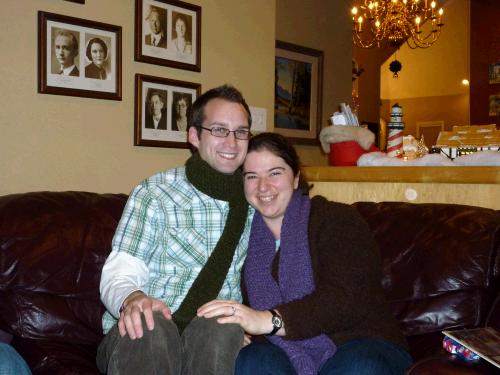 The married kids opened their gifts Christmas Eve before they left since they would be with Anne's family Christmas Day.  I made them matching scarves.  Anne especially liked hers because it was non-itchy yarn and of course purple is her favorite color...gotta work hard for those mother-in-law points!