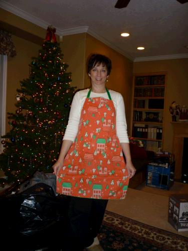 This apron used to belong to my mother and she would wear it Christmas Eve.  My sister Melanie has had it these past 13 years and offered it to me when I was helping her move.  It was fun to wear it. We miss her.