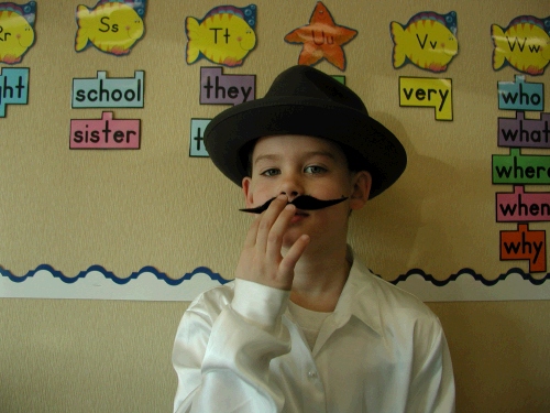 I don't know. . . . It's probably the mustache, since I'm betting Grandpa Moser wasn't only 4' 5" tall!