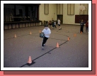 We took all the kids down the street to the church where we did various sports relays.  Here is Clark dribbling away...