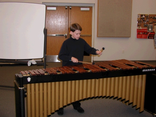 Elliot playing Solfeggietto on the marimba in his first real percussion recital.