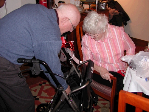 The family gave her a new walker - it has a seat...and everything!