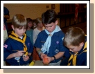 Making rockets with his friends.