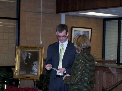 Loren getting his badge and meal card, I think....