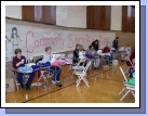 We had several people sewing up the fleece cancer caps.