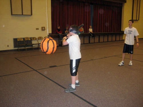 The final activity -- a basketball piata filled with treats -- fun.