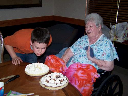 She needed a little help from Clark to blow out the candles.