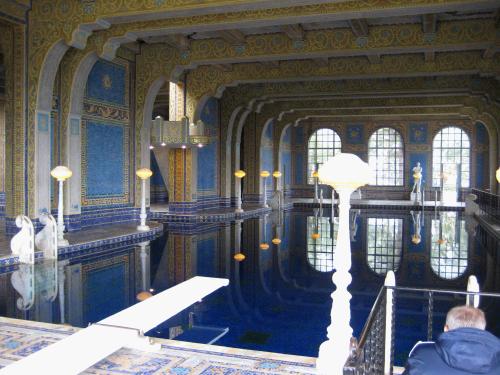 The indoor pool was 10 feet deep and beautifully reflected all the magnificent tile work on the walls and ceilings.  The part jutting out half way down the left side of the room is a diving platform.