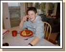 This is Clark's birthday dinner on his actual birthday.  Ever since he was a wee one, he has wanted grilled cheese and French fries -- works for me!  He is taking a "birthday call" from his sister Madeleine.