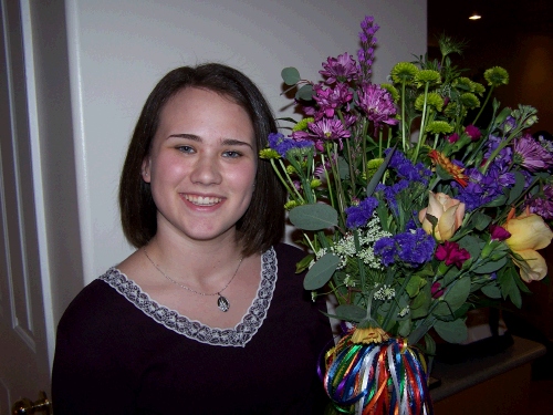 The Young Womanhood Recognition Award is the silver necklace with the Salt Lake Temple on it.  Tess is a great girl.