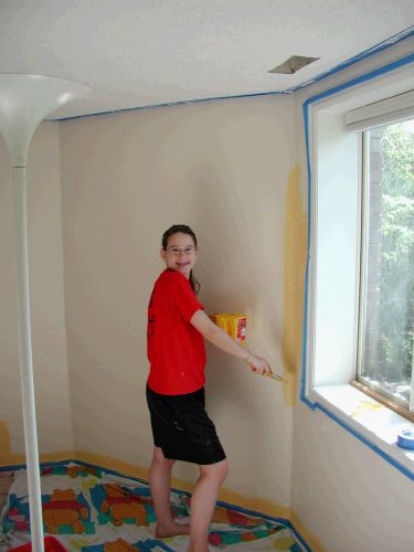 Painting Loren's old room a cheery yellow.