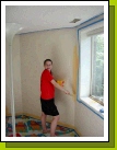 Painting Loren's old room a cheery yellow.