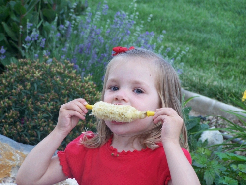 Karen Crapo enjoying her corn on the cob.