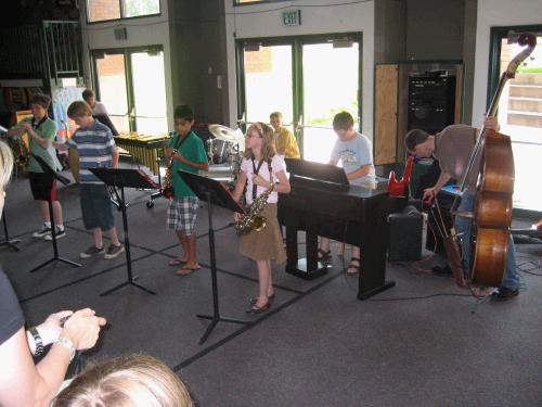 Clark as the pianist for his jazz band.