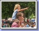 Anna happy to watch the parade from her Dad's shoulders.