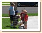 Clark and Elliot teaching the Hooligans how to play football.