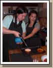 The first class they took was a pastry class.  This is their instructor Rachel showing Anne how to glaze Crme Brle.