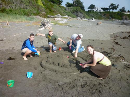 But of course...each beach trip has to include (by tradition) the building of a family sandcastle.