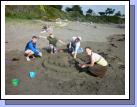 But of course...each beach trip has to include (by tradition) the building of a family sandcastle.