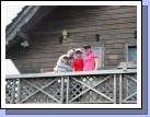 The kids standing on the deck of our beach house.