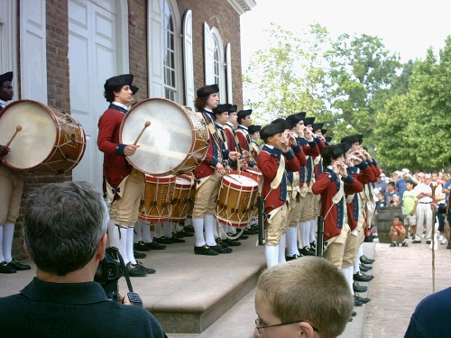 Fifers and drummers getting ready to march down Duke of Gloucester Street. 