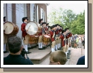 Fifers and drummers getting ready to march down Duke of Gloucester Street. 