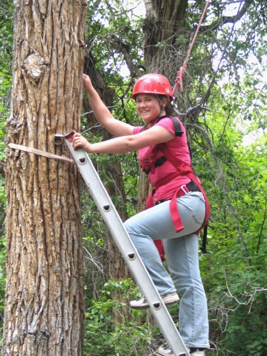 Tess climbing up to eagle's perch
