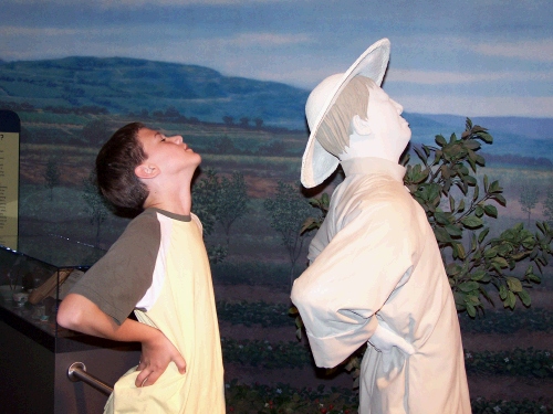 This guy's back was aching from picking strawberries in California.  Elliot's back is aching from walking around museums for hours!