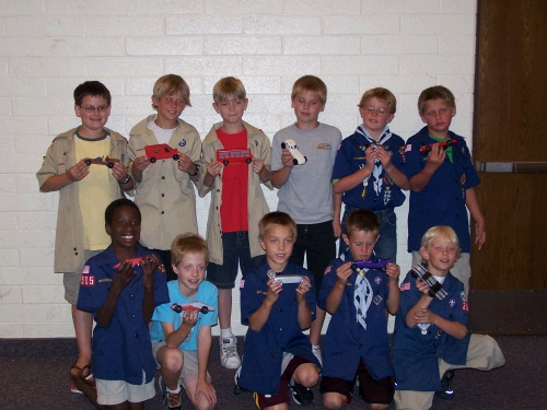 Our ward's Wolves, Bears and Webelos.  
Our family's last pinewood derby . . . wahoo! . . . Oh, I mean darn. . . .