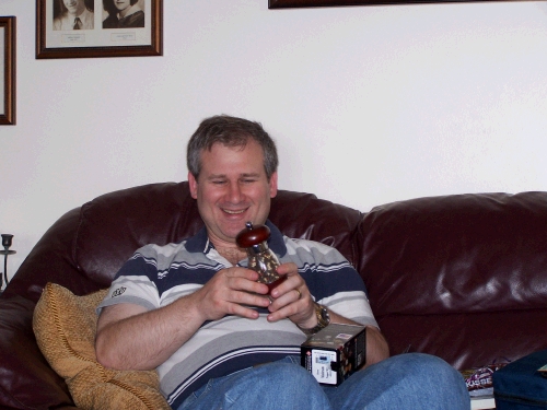 A peppergrinder -- Alan loves fresh ground pepper on his food -- just look how happy he is!