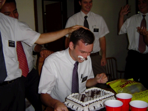 Mordida! In Mexico and South Texas they have a quaint custom called Mordida ("little bite"), where they smash the face of the birthday person into their birthday cake. It appears that despite Loren's best efforts to avoid the custom, his friends were successful!