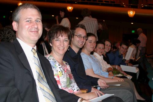 The family awaiting Madeleine's graduation ceremony at Abravanel Hall.