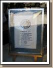 This is a little difficult to read because of the glare, but it is a Guinness World Record Certificate stating: "The oldest restaurant in the world is Restaurante Botin, in Calle Cuchilleros, Madrid, Spain, which opened in 1725 and has been operating ever since; it even retains the original 18th century firewood oven.  It is currently run by the Gonzalez family."