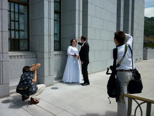 The happy couple having their picture taken yet again.