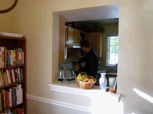 Cute pass-through window between the dining area and the kitchen.