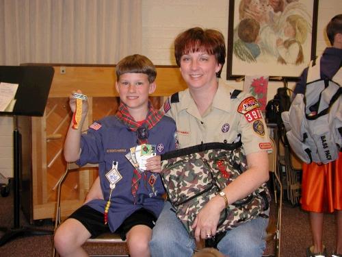 Elliot with his favorite Bear Den Leader!  It is so sad that he isn't in my group anymore...