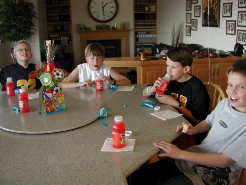 The party guests having a "power snack" before the big game.