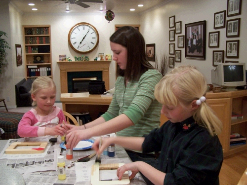 Madeleine helping Marielle and Emily.