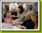 Madeleine helping Marielle and Emily.