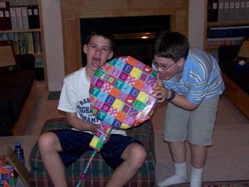 Clark's creative wrapping of an oversized frisbee and a box of candy.