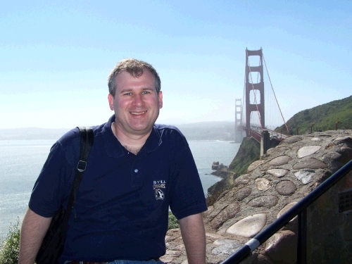 Alan at the other end of the bridge.  When we first got there, the bridge was covered in fog.  But, as we stood there watching, it all rolled away.