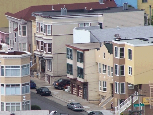 Of course you can,  I just used my super duper camera to zoom up on it! Hers is the tall tan one with the bay windows.