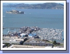 The view of Alcatraz and Pier 39 from the top of Coit Tower.  Yeah, we were tired -- and then we had to walk back down the hill and to our hotel.  I need to get better walking shoes!