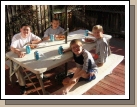 Boy cousins having dinner on the deck.  It was a beautiful day! LtoR: Clark, Joe, Ben, Coby