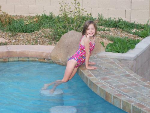 Cold water didn't deter Karen - she was so excited to swim.  The pool has four "bar stools" in the water, so that you can sit up to the tile counter and eat a burger -- bring on the barbeque, Jared!