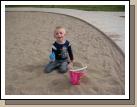 Jackson loves digging in the sand.