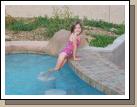 Cold water didn't deter Karen - she was so excited to swim.  The pool has four "bar stools" in the water, so that you can sit up to the tile counter and eat a burger -- bring on the barbeque, Jared!