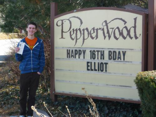 Terri Jones was kind enough to put Elliot's birthday on the marquee by the Pepperwood entrance. He's holding his driver's license (well, the temporary one, at least) that he got just a few minutes before.