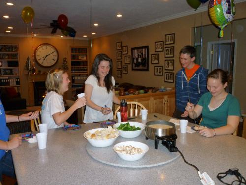 Fondue for Elliot's surprise party. Why are there so many girls at the party?